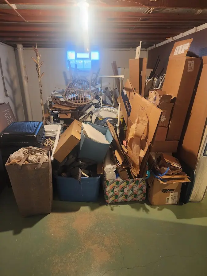 Roll-off dumpster container at job site for Yard Waste Dumpster Rental in New Kensington